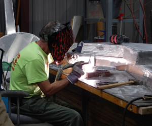 welding on sculpture at Carolina Bronze Sculpture