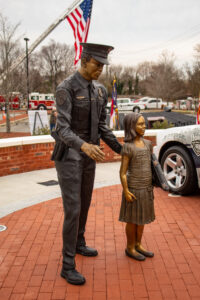 Standing Officer and Girl